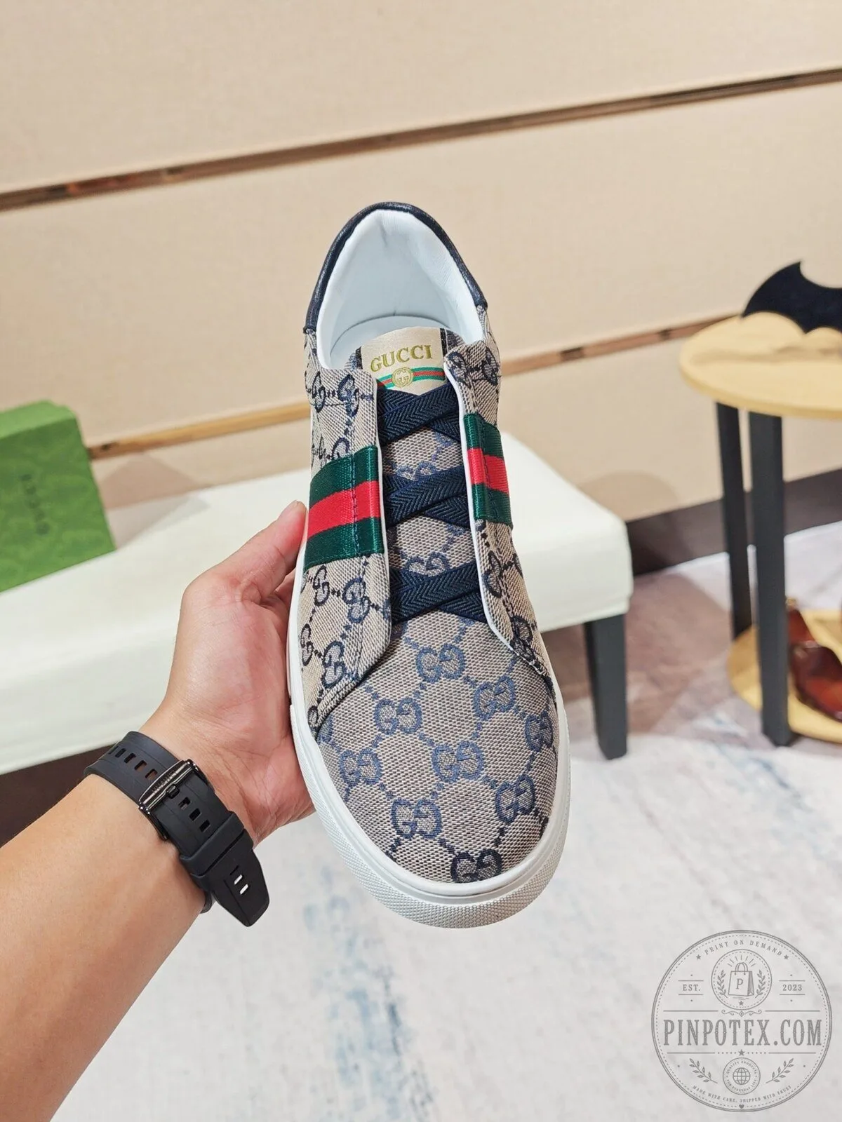 Gucci Monogrammed Canvas Low Top Sneakers with Red and Green Stripe Detail